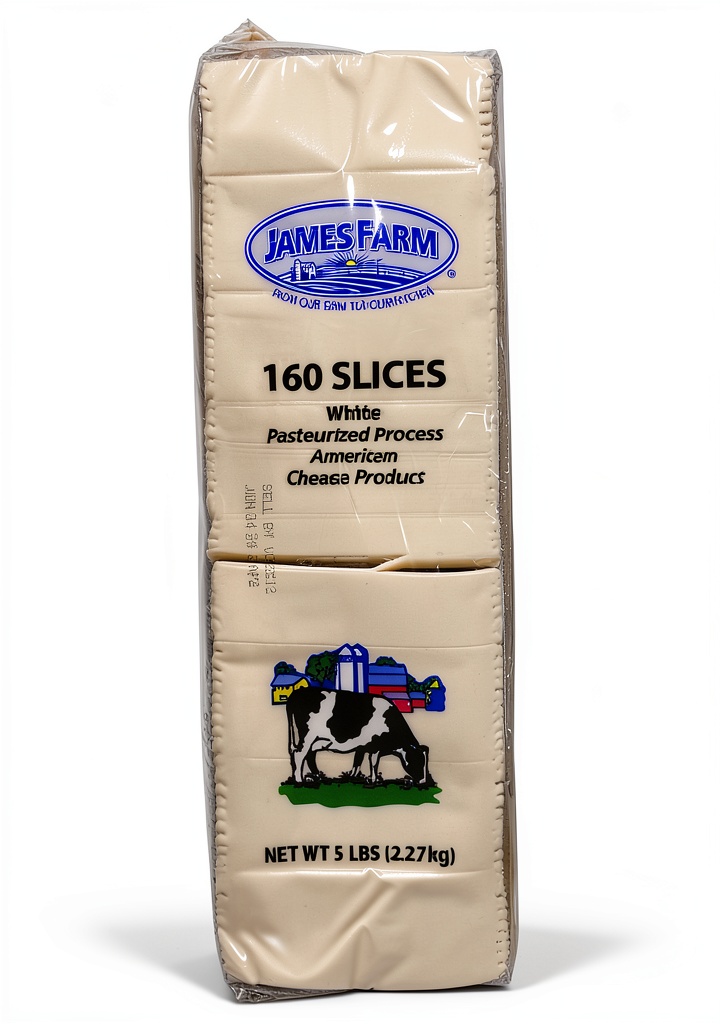'James Farm American Cheese block displayed on a kitchen counter'